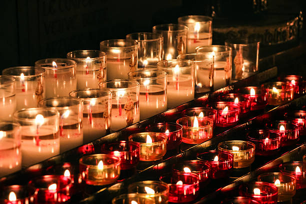 istock candles in church 615895074