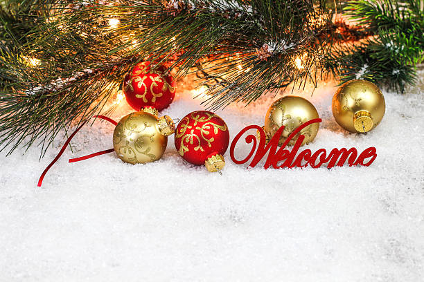 istock Holiday welcome sign with Christmas decor and white copy space 615895542