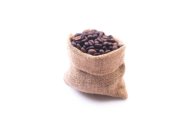 istock coffee beans in bag isolated on white background 615896434