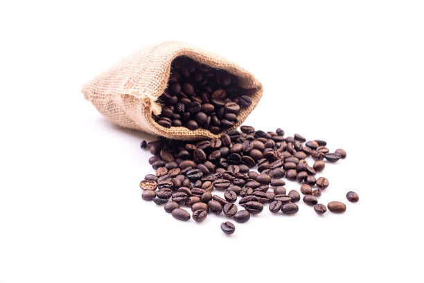 istock coffee beans in bag isolated on white background 615896472