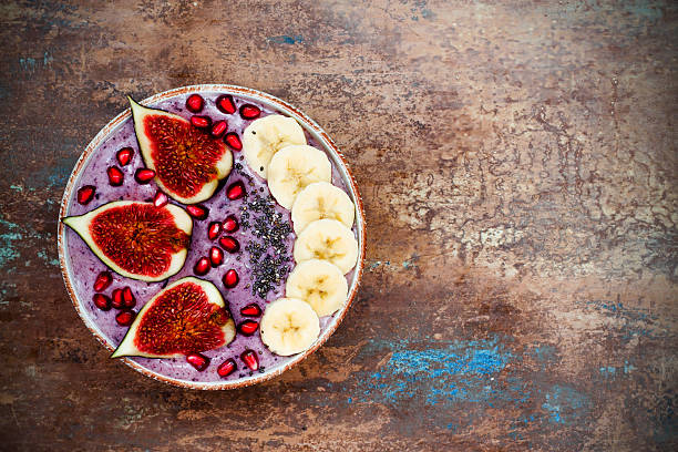 istock Fall and winter breakfast acai superfoods smoothies bowl. Copy space 615897676