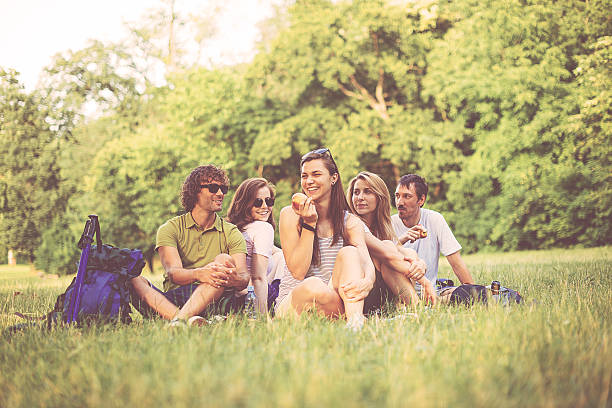 istock Desaturated image of people in nature at picnic 615899188