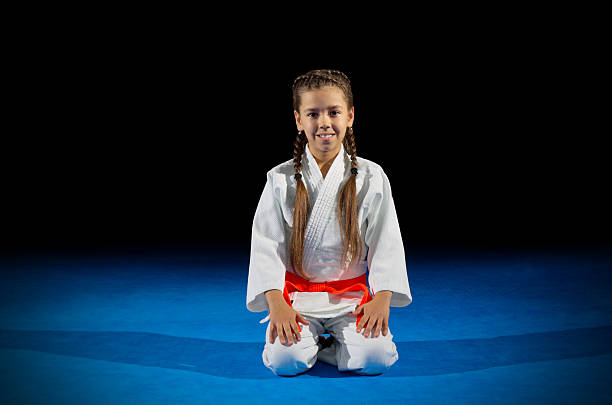 istock Girl martial arts fighter 615901026