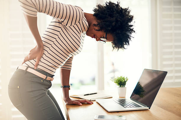 istock Poor posture can lead to back pain 615901460