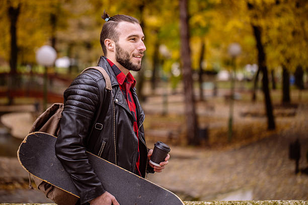istock Young hipster skater smiling 615903916