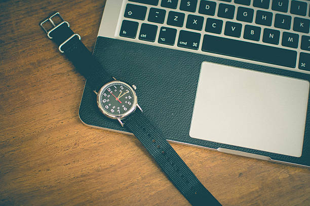 istock Watch on the desk 615908328