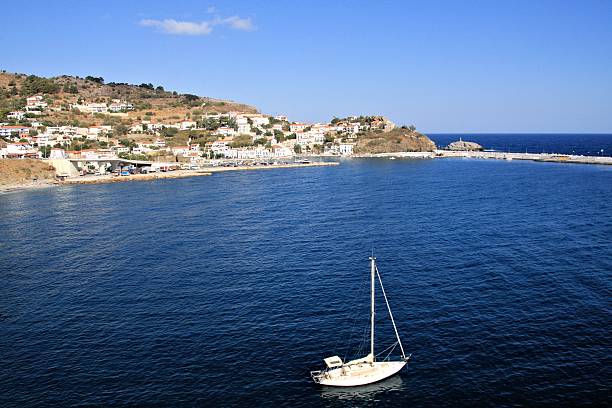 Evdilos town at Ikaria island Panoramic view of Εvdilos town at the Greek island of Ikaria ikaria island stock pictures, royalty-free photos & images