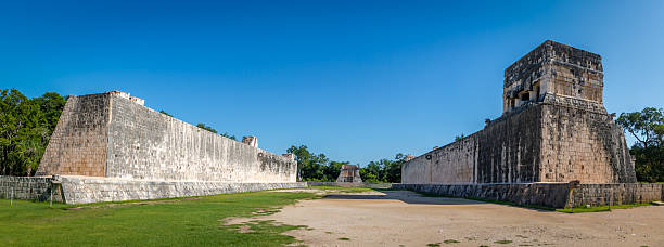 istock Panoramic view of ball game court at Chichen Itza, Mexico 615911576