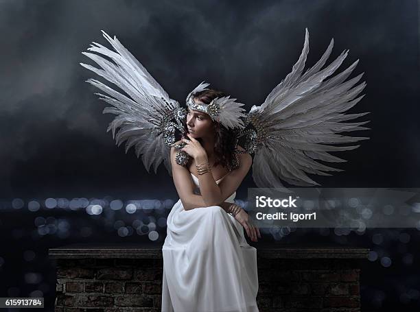 Beautiful Woman In White Dress With Angel Wings Stock Photo - Download Image Now - Angel, Women, One Woman Only