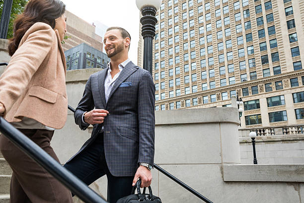 istock Business people walking in Downtown Chicago 615914674