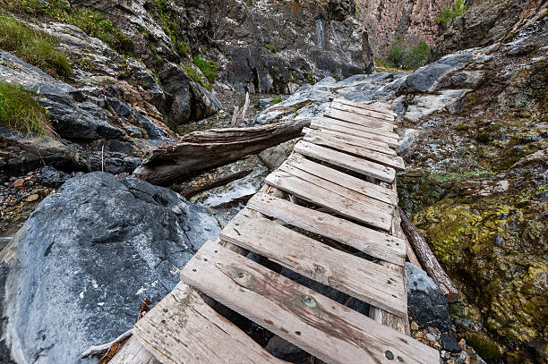 istock Wooden gangway in a gorge 615916170
