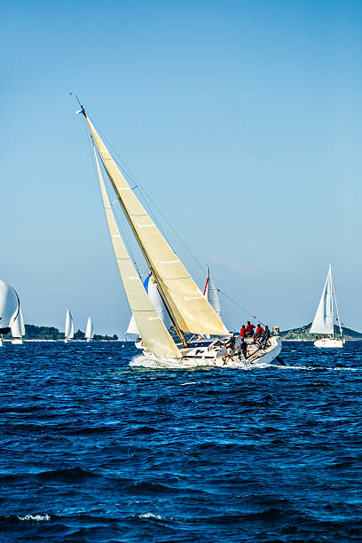 istock Sailing crew on sailboat during regatta 615916402