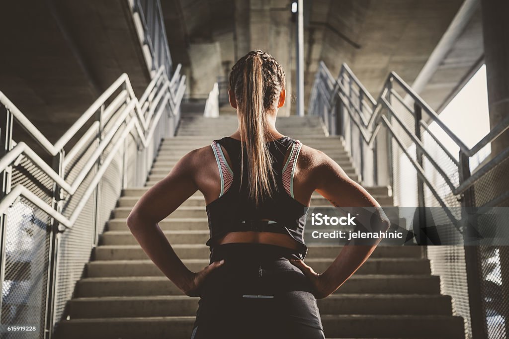 Girl prepairing for workout Exercising Stock Photo