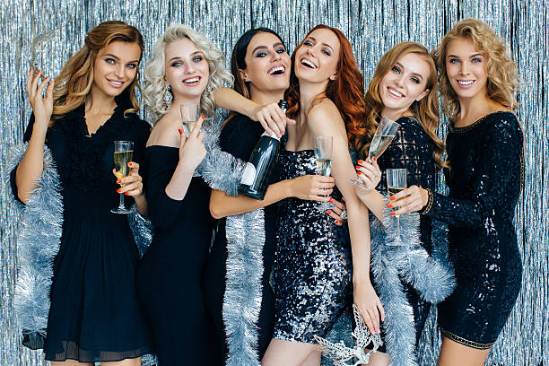 Photo of beautiful girls celebrating new year Photo of beautiful girls celebrating new year number 6 photos stock pictures, royalty-free photos & images
