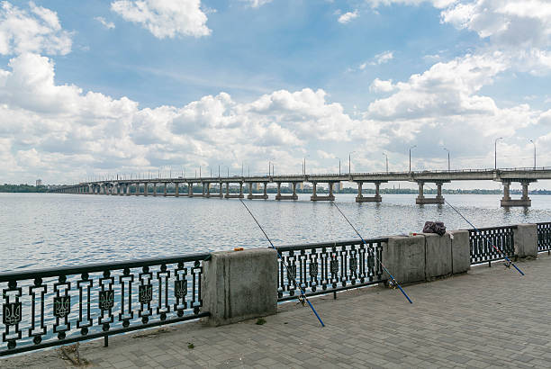 istock long concrete bridge across the Dnieper River. 615920368