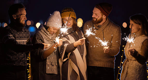 istock Happy friends celebrating New Year 615921536