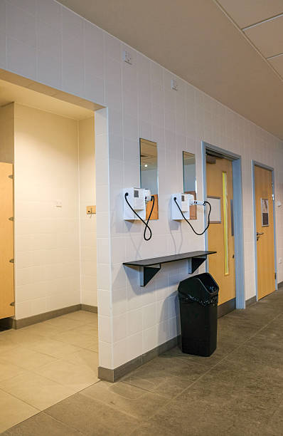 istock Public changing room hairdryers 615928316