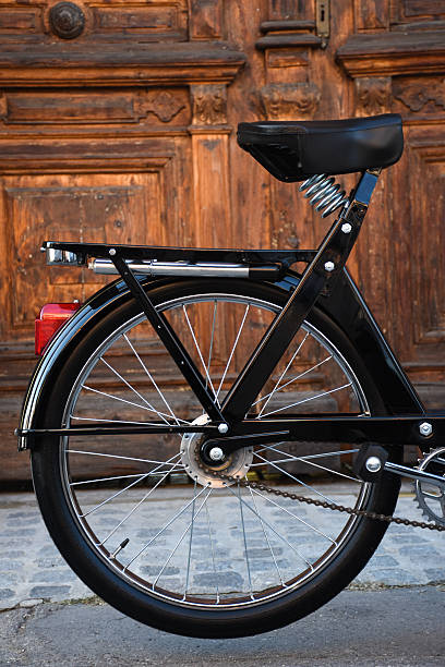 istock Rear end of a black vintage bicycle 615975978