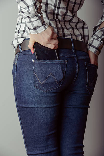 istock smartphone in the pocket of jeans 615978622