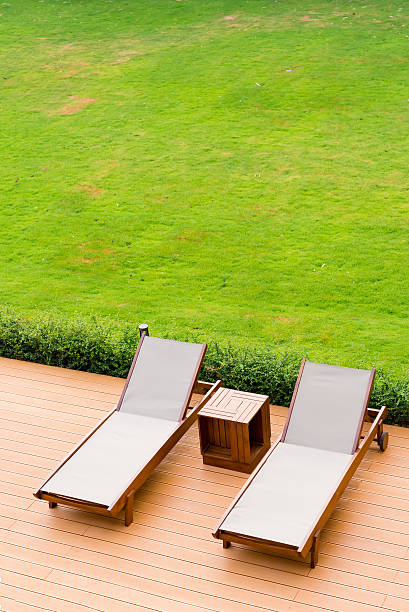 istock Pool bed beside the tropical resort swimming pool 615982860