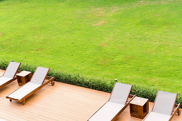 istock Pool bed beside the tropical resort swimming pool 615982952