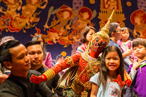 Bangkok, Thailand - January 16 2016: Thai traditional puppet play displayed openly for public at Thai Cultural Center in a campaign for the conservation of Thai traditional performing arts
