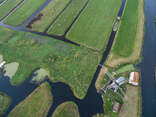 istock Windmill aerial view at holland country side, Netherlands 615988930