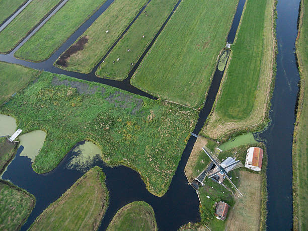 istock Windmill aerial view at holland country side, Netherlands 615988974