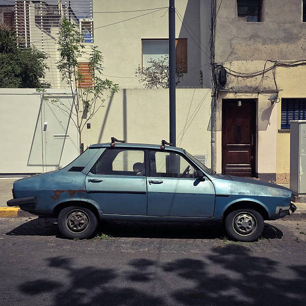 istock Old car parked in the street 615989926