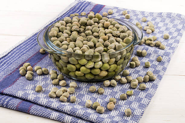dried peas in a bowl with cold water