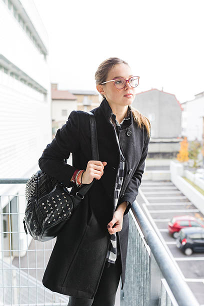 istock Young student woman at university. 616000258