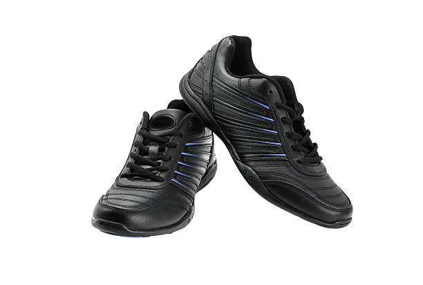 istock pair of black sneakers 616004178