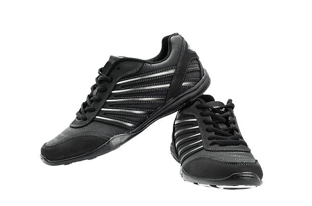 istock pair of black sneakers 616004310