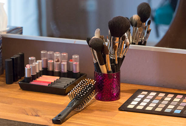 istock Brushes, lipsticks, palette and hairbrush 616006426