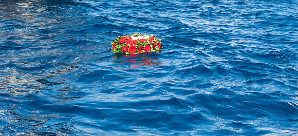 istock memorial wreaths on the sea 616007900