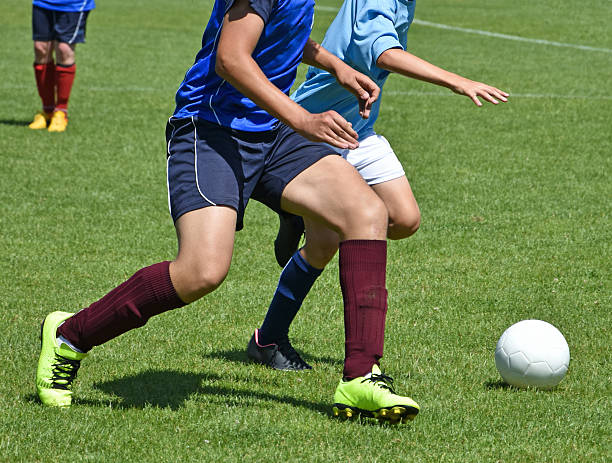 istock Young soccer players in action 616008838