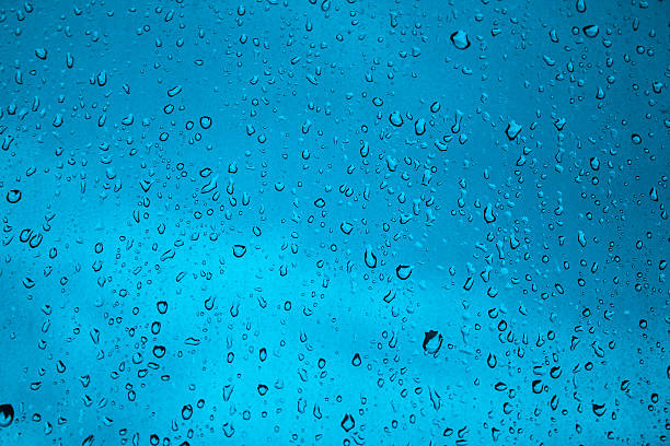 Water drops texture blue background stock photo