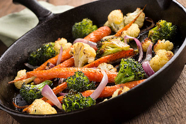 Roasted Vegetables Fresh Vegetables Roasted in a Cast Iron Skillet. sauteed stock pictures, royalty-free photos & images