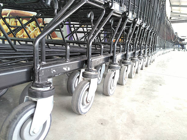 istock cart  several rows combine in shops supermarkets 616011938
