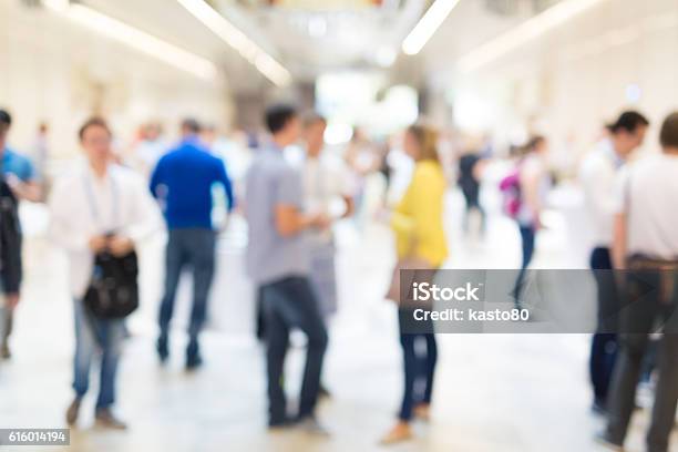 Abstract Blurred People Socializing During Coffee Break At Business Conference Stock Photo - Download Image Now