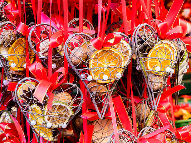 istock Heart shaped Christmas decorations with fruit, red colors 616016940