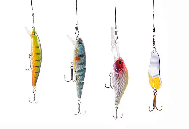 four fishing wobblers isolated on white background