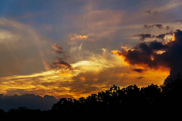 istock Beautiful sunrise and dramatic clouds on the sky. 616017412