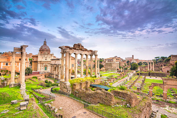 istock sunset at roman forum in rome, italy 616018614