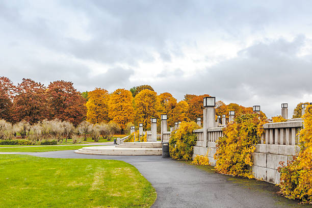 Autumn colors in the Frogner Park Oslo Orange  colored trees  in fall in Gustav Vigeland Sculpture park, a public park in  Frogner, Oslo, Norway norway autumn oslo tree stock pictures, royalty-free photos & images