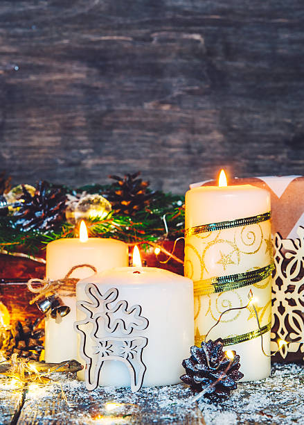 istock Christmas home decoration.Deer,pine cones on wooden table. 616021128