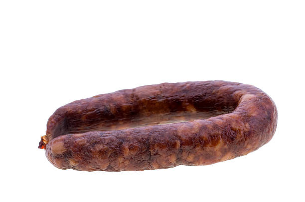 istock Baked homemade sausage Isolated white background 616089380