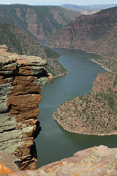 istock Desert Gorge With Red Rock, Cliff And River Bend 616089776