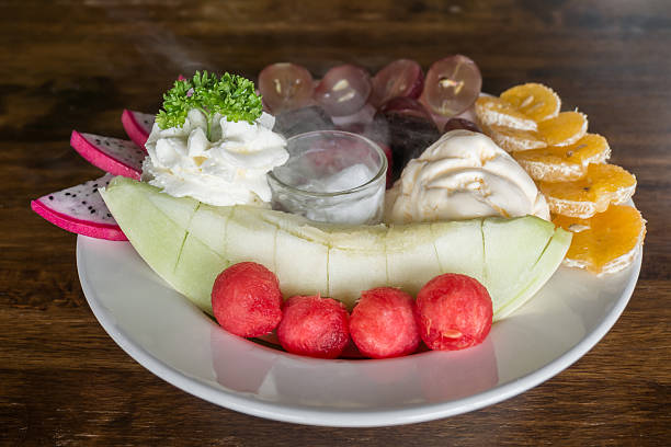 istock Mixed fruits with ice cream and dry ice 616091220
