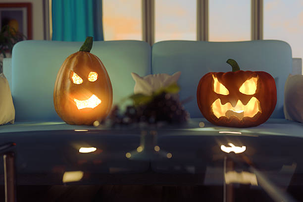 istock 3d rendering of horrified pumpkins sitting on the sofa 616091568